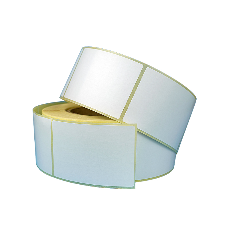 How does a white/blue grid background design improve the readability and alignment accuracy of printed tag paper?